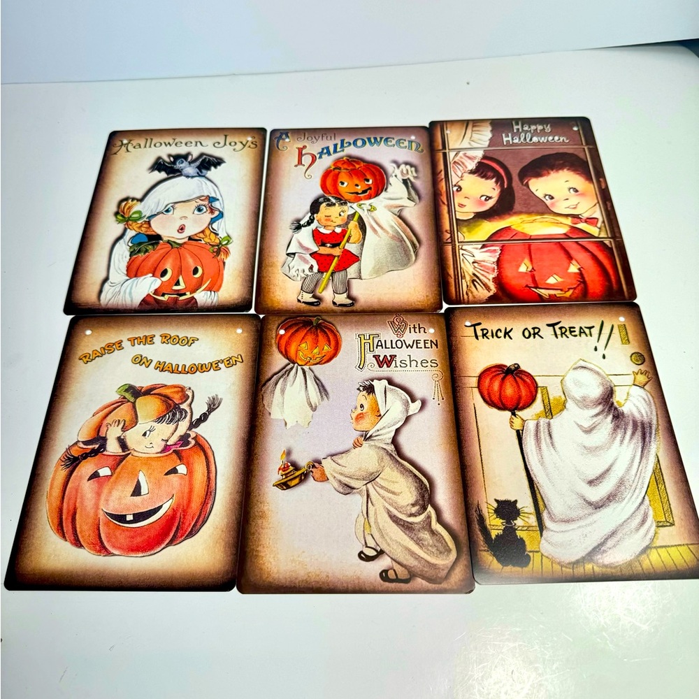 Six paper cardboard Halloween signs featuring vintage style retro sartwork.